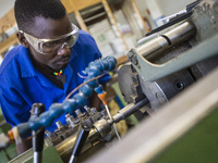 Fitting and Turning Trade of the Windhoek Vocational Training Centre, Namibia, on May 12, 2016. Students work with Lathe machine making a wo...