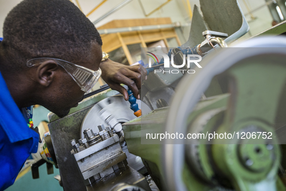 Fitting and Turning Trade of the Windhoek Vocational Training Centre, Namibia, on May 12, 2016. Students work with Lathe machine making a wo...