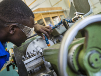 Fitting and Turning Trade of the Windhoek Vocational Training Centre, Namibia, on May 12, 2016. Students work with Lathe machine making a wo...