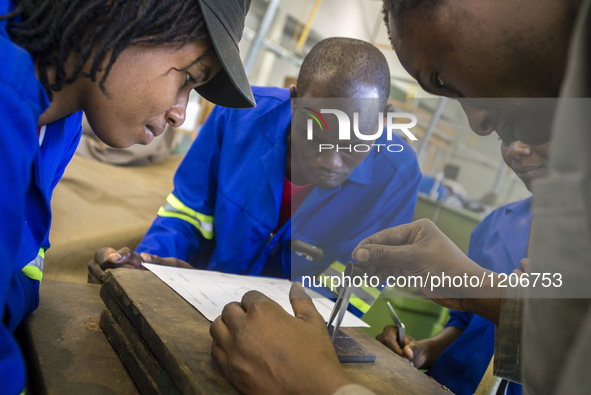 Fitting and Turning Trade of the Windhoek Vocational Training Centre, Namibia, on May 12, 2016. Students practice in making steel details. 