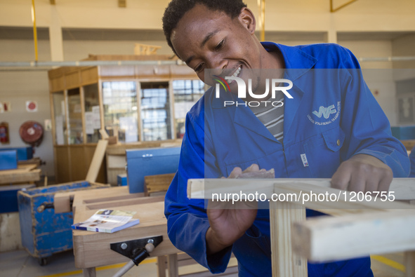 Student of Cabinetmaking Trade making chair at workshop of the Windhoek Vocational Training Centre, Namibia, on May 12, 2016 