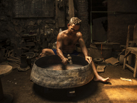 A worker forge gamelan in Gamelan Daliyo Legiyono, Pelem Lor Batu Retno Village, Banguntapan, Yogyakarta, Indonesia, on May 13, 2016. Gamela...