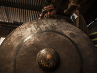 A worker forge gamelan in Gamelan Daliyo Legiyono, Pelem Lor Batu Retno Village, Banguntapan, Yogyakarta, Indonesia, on May 13, 2016. Gamela...