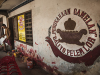 A worker walking  in Gamelan Daliyo Legiyono, Pelem Lor Batu Retno Village, Banguntapan, Yogyakarta, Indonesia, on May 13, 2016. Gamelan Dal...