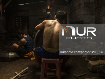 A worker forge gamelan in Gamelan Daliyo Legiyono, Pelem Lor Batu Retno Village, Banguntapan, Yogyakarta, Indonesia, on May 13, 2016. Gamela...