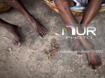 DHAKA, BANGLADESH - MAY 12: Labourers of Karwan Bazar break for a mid-day siesta to beat the hot summer noon in their workplace at Karwan Ba...