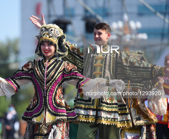 Models present costumes at Sino-Russian-Mongolian Costume Festival in Hulunbuir, north China's Inner Mongolia Autonomous Region, June 24, 20...