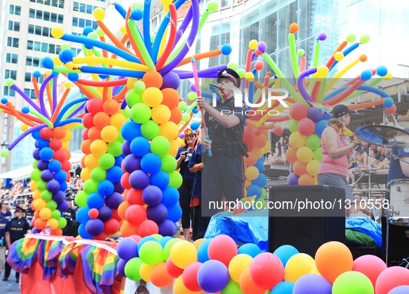 Revellers take part in the 2016 Toronto Pride Parade in Toronto, Canada, July 3, 2016.