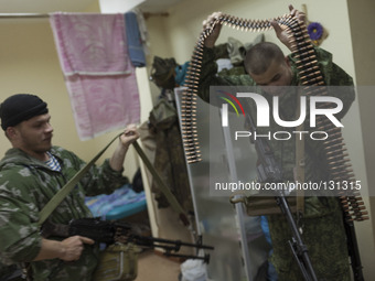 Militiamen from the Russian Orthodox Army seen inside their headquarters in the occupied SBU building in Donetsk, eastern Ukraine, on May 5t...