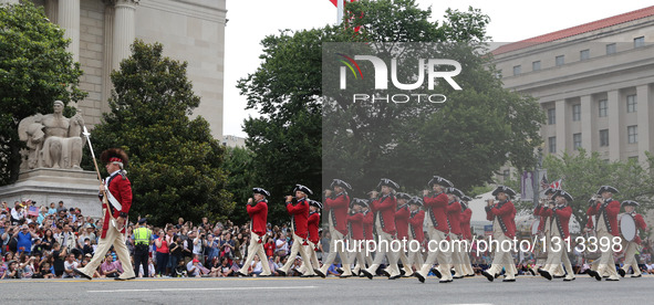 People take part in the Independence Day parade in Washington D.C., capital of the United States, July 4, 2016. The United States celebrated...