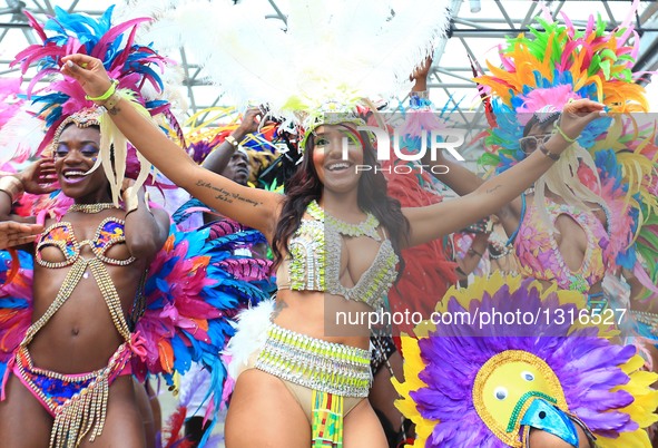 Dressed up revellers perform during the official launch ceremony of the 2016 Toronto Caribbean Carnival at Nathan Philips Square in Toronto,...