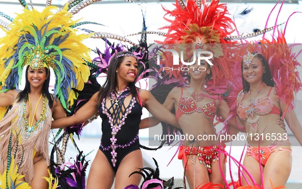 Dressed up revellers perform during the official launch ceremony of the 2016 Toronto Caribbean Carnival at Nathan Philips Square in Toronto,...