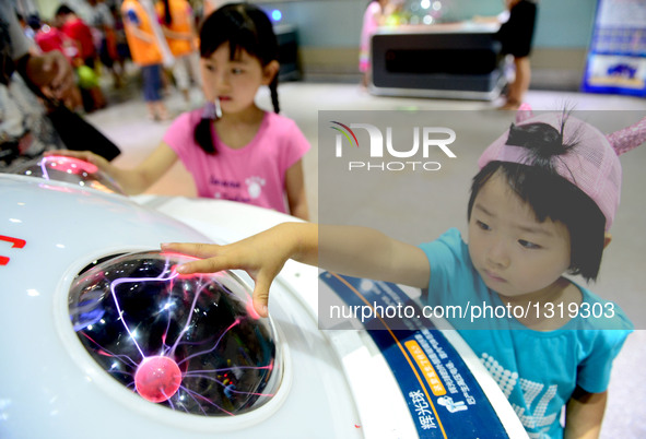 Children visit the Zhengzhou Science Museum during summer vacation in Zhengzhou, capital of central China's Henan Province, July 6, 2016.