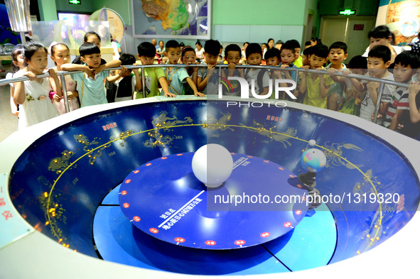 Children visit the Zhengzhou Science Museum during summer vacation in Zhengzhou, capital of central China's Henan Province, July 6, 2016.