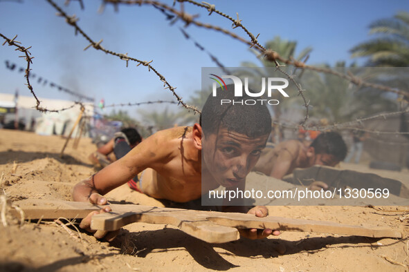 Palestinians take part in a military exercise at a summer camp, organized by Islamic Jihad movement, in the southern Gaza Strip City of Khan...