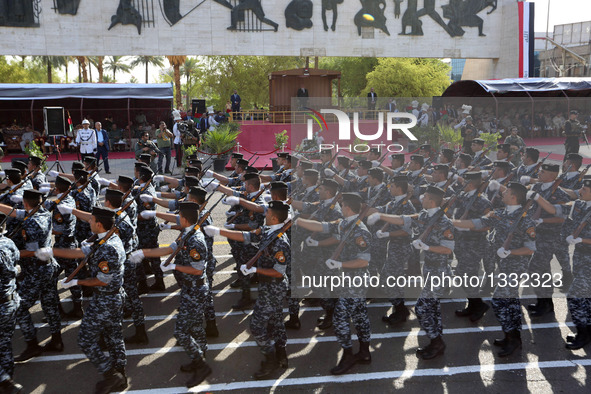 Iraqi security forces take part in a military parade in Baghdad, Iraq, July 14, 2016. Prime Minister Haider al-Abadi on Thursday presided ov...