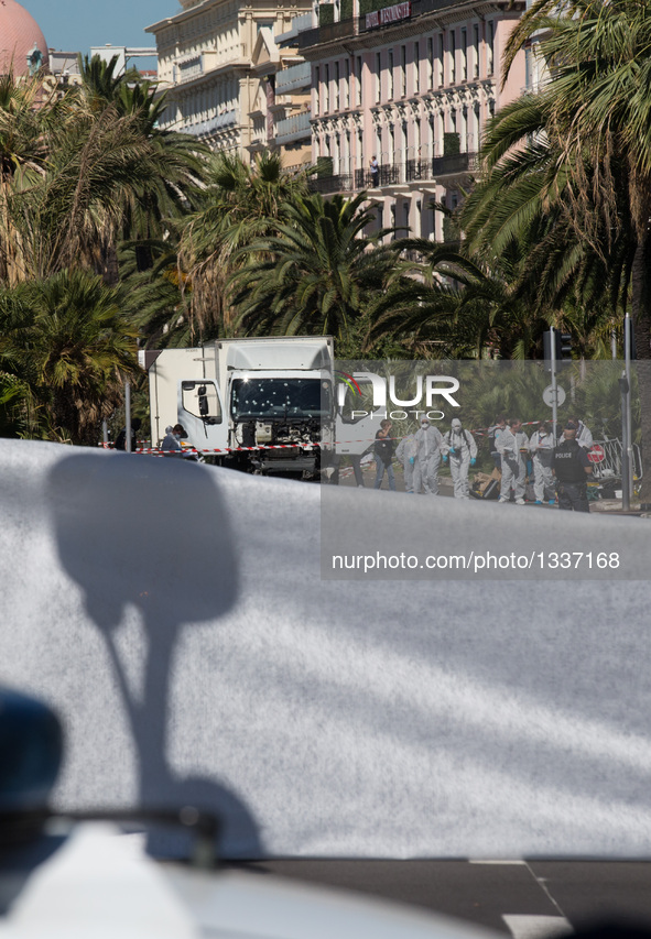 The truck which ploughed into spectators is seen at the site of the terrorist attack in Nice, France, July 15, 2016. The death toll rises to...