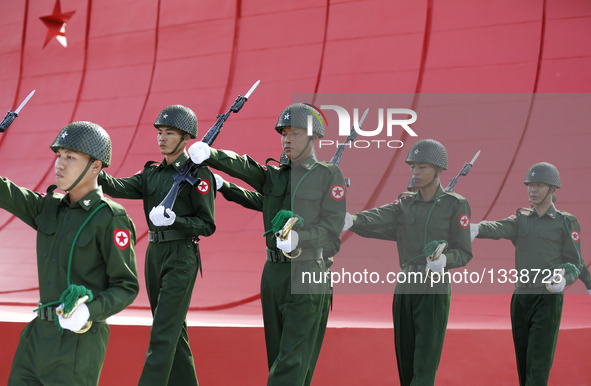 Honor guards march during a ceremony to mark the 69th Martyrs' Day in Yangon, Myanmar, July 19, 2016. Myanmar held a state ceremony Tuesday...