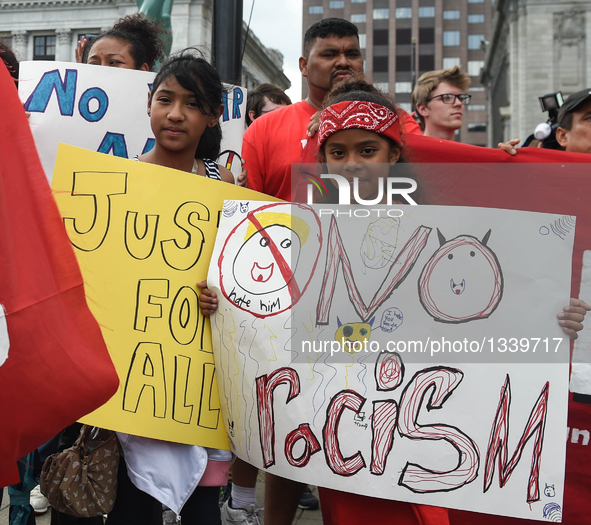 People protest against Donald Trump on the first day of the Republican National Convention in Cleveland, Ohio, the United States, July 18, 2...