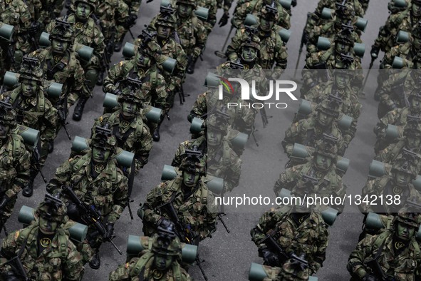 Soldiers take part in a military parade during a commemoration of the 206th anniversary of Independence, in Bogota, Colombia, on July 20, 20...