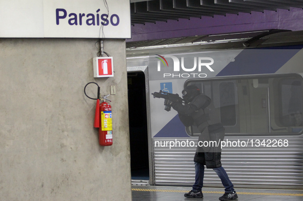 Members of security forces takes part in an anti-terrorism attack drill in Paraiso Metro Station, in Sao Paulo, Brazil, on July 20, 2016. Th...