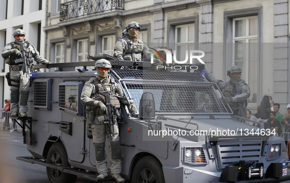 Belgian SWAT police attend the Military Parade to celebrate Belgium's National Day in Brussels, Belgium, July 21, 2016.