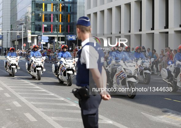 Belgian Police pass by during the Military Parade to celebrate Belgium's National Day in Brussels, Belgium, July 21, 2016.