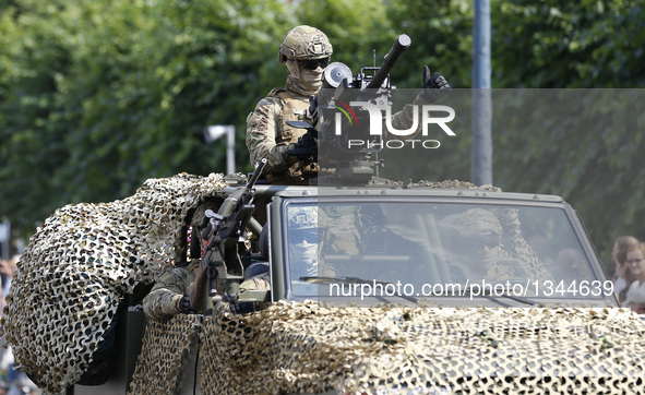 Belgian Special Forces soldiers attend the Military Parade to celebrate Belgium's National Day in Brussels, Belgium, July 21, 2016.