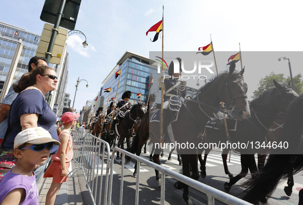 Cavalry in traditional uniforms attend the Military Parade to celebrate Belgium's National Day in Brussels, Belgium, July 21, 2016.