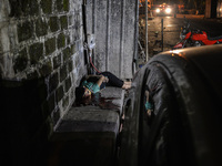 (EDITORS NOTE: Image depicts graphic content.) The corpse of a suspected drug pusher and victim of a vigilante-style execution with his limb...