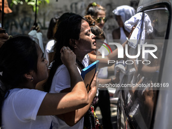 The wife of a suspected drug pusher and victim of a vigilante-style execution grieves during a burial ceremony in Pasay, south of Manila, Ph...