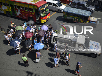 Relatives of a suspected drug pusher and victim of a vigilante-style execution take part in a burial ceremony in Pasay, south of Manila, Phi...