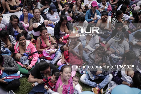 Mothers and babies take part in a public breastfeeding event in Bogota, capital of Colombia, on Aug. 3, 2016. The event is held for the Worl...