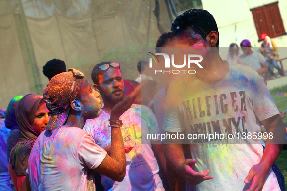 People participate in the India Color Festival during a high temperature summer day in Cairo, Egypt, on August 12, 2016.