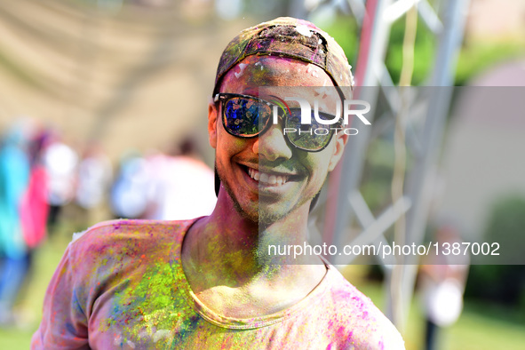 A man participates in the India Color Festival during a high temperature summer day in Cairo, Egypt, on August 12, 2016.