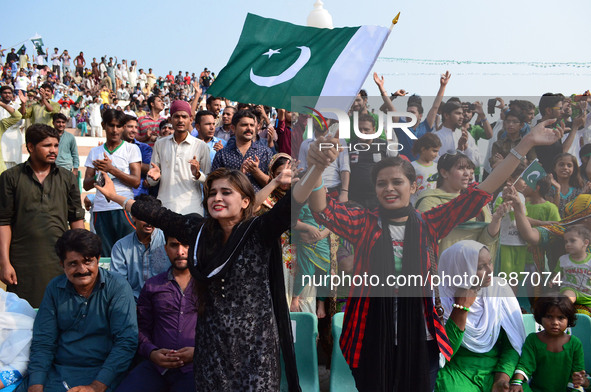 Pakistani people attend a ceremony celebrating Pakistan's Independence Day in eastern Pakistan's Lahore on Aug. 14, 2016.