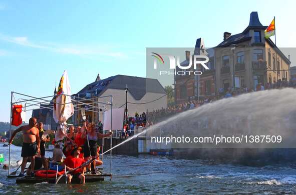 Participants take part in the International Bathtub Regatta on the Meuse River in Dinant, southern Belgium on Aug. 15, 2016. Starting in 198...