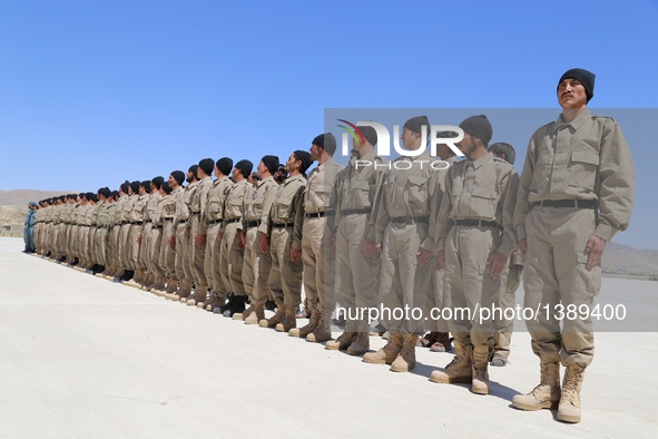 Afghan policemen take part in their graduation ceremony in Ghazni province, Afghanistan, Aug. 16, 2016. A total of 130 local policemen gradu...