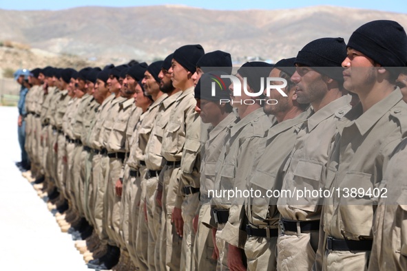 Afghan policemen take part in their graduation ceremony in Ghazni province, Afghanistan, Aug. 16, 2016. A total of 130 local policemen gradu...