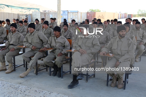 Afghan policemen take part in their graduation ceremony in Ghazni province, Afghanistan, Aug. 16, 2016. A total of 130 local policemen gradu...