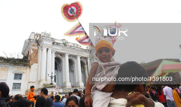 A Nepalese child participates in a parade during the Gaijatra festival, or festival of cows, in Kathmandu, Nepal, Aug. 19, 2016. Hindus cele...