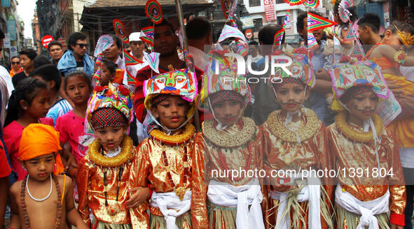 Nepalese children participate in a parade during the Gaijatra festival, or festival of cows, in Kathmandu, Nepal, Aug. 19, 2016. Hindus cele...