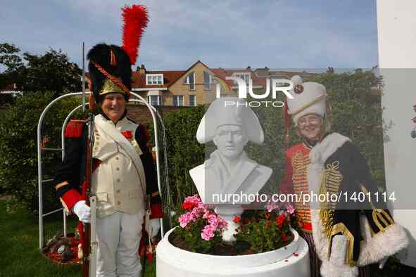 Jasques Fieuw and his wife Pauline pose with a Napoleon sculpture in their garden in Brussels, Belgium, Aug. 16, 2016. Both Fieuw and his wi...