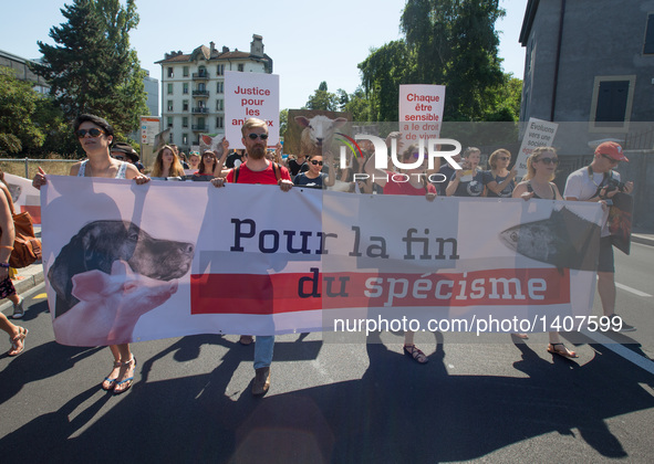 Animal rights activists take part in a rally in Geneva, Switzerland, Aug. 27, 2016. Thousands of animal rights activists from "Pour l'Egalit...