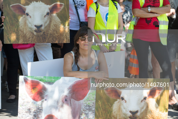 An animal rights activist takes part in a rally in Geneva, Switzerland, Aug. 27, 2016. Thousands of animal rights activists from "Pour l'Ega...