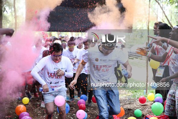 Runners participate in the Color Run in Nairobi, capital of Kenya, Aug. 28, 2016. The Color Run, known as "Happiest 5km on the Planet", was...