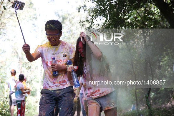 Runners participate in the Color Run in Nairobi, capital of Kenya, Aug. 28, 2016. The Color Run, known as "Happiest 5km on the Planet", was...