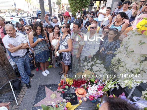 People gather at the Hollywood Walk of Fame star of Juan Gabriel in Los Angeles, California, the United States, Aug. 29, 2016. Beloved Mexic...