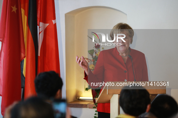 German Chancellor Angela Merkel speaks during the opening ceremony of the Confucius Institute in Stralsund Aug. 30, 2016. Angela Merkel on T...