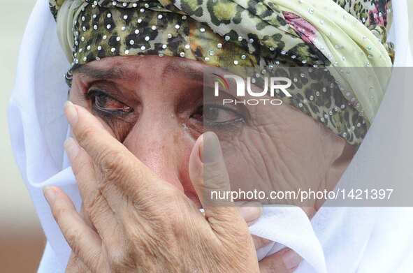 A woman cries for the death of the late president of Uzbekistan Islam Karimov in Samarkand, Uzbekistan, on Sept. 3, 2016. The funeral of the...